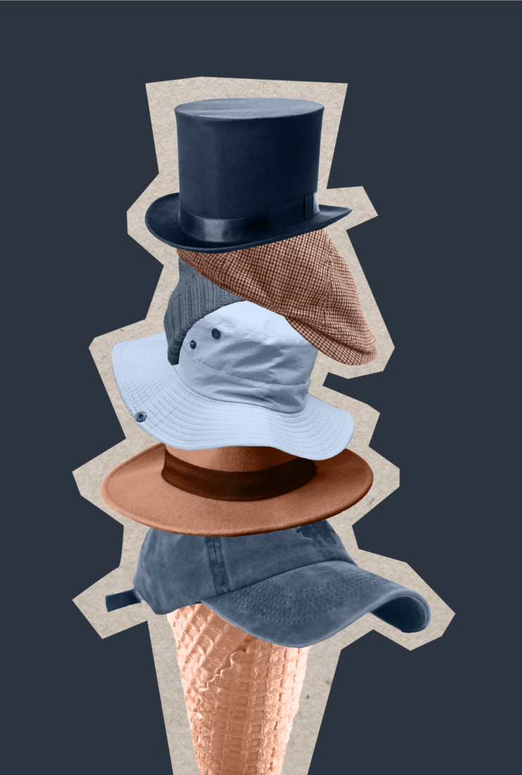 Hats are stacked, to demonstrate the variety of tasks involved in working with a not-for-profit.